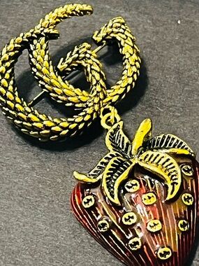 Gold-Tone Strawberry Pendant Brooch with Textured Chain Accent